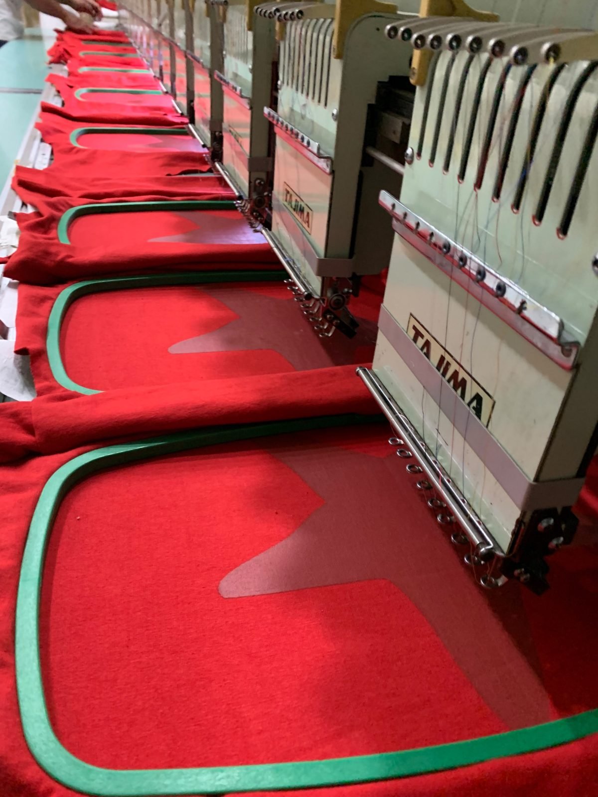 Embroidery machines running at the Nyxlete facility
