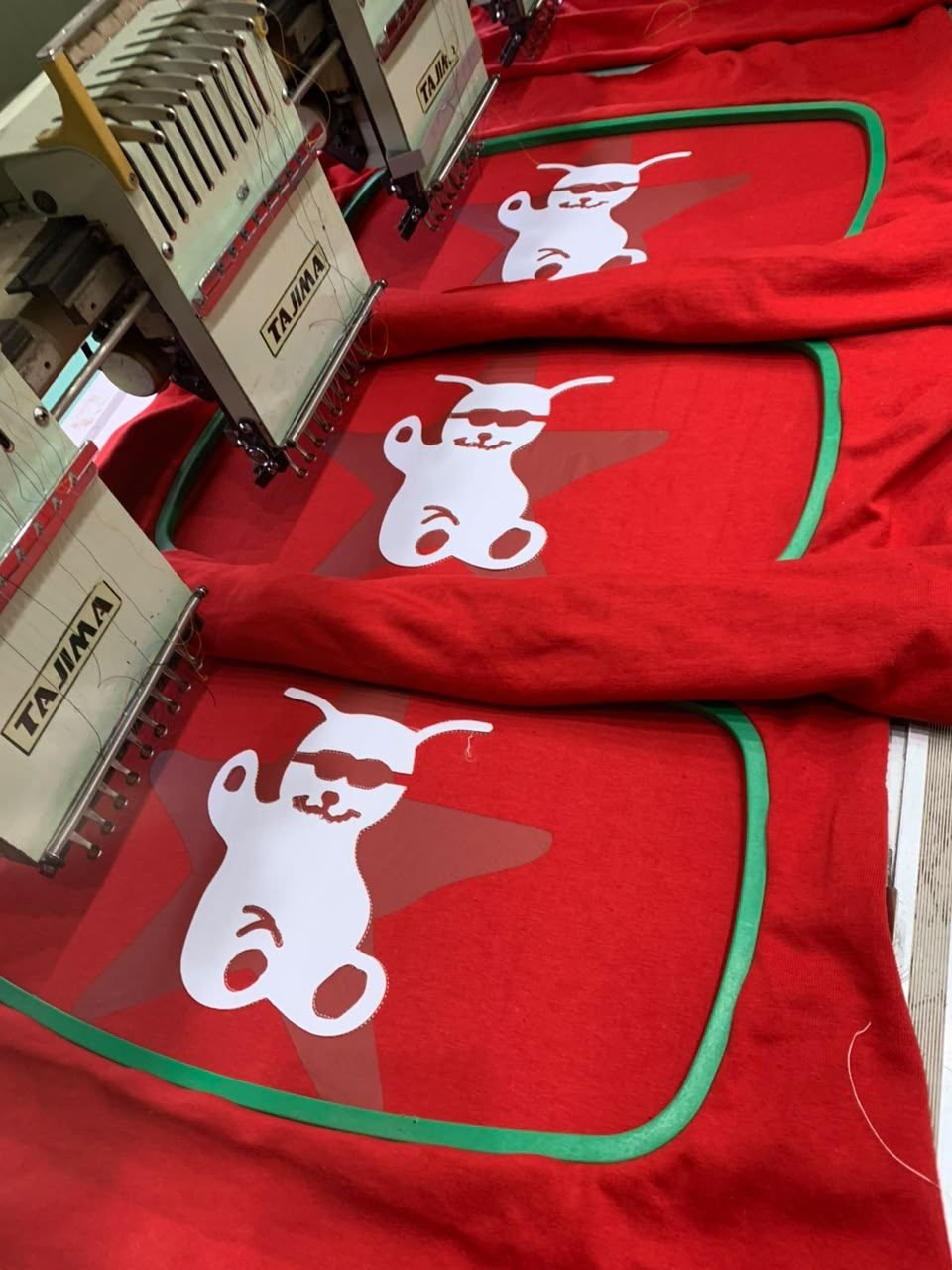 Embroidery machine detail, mid-production