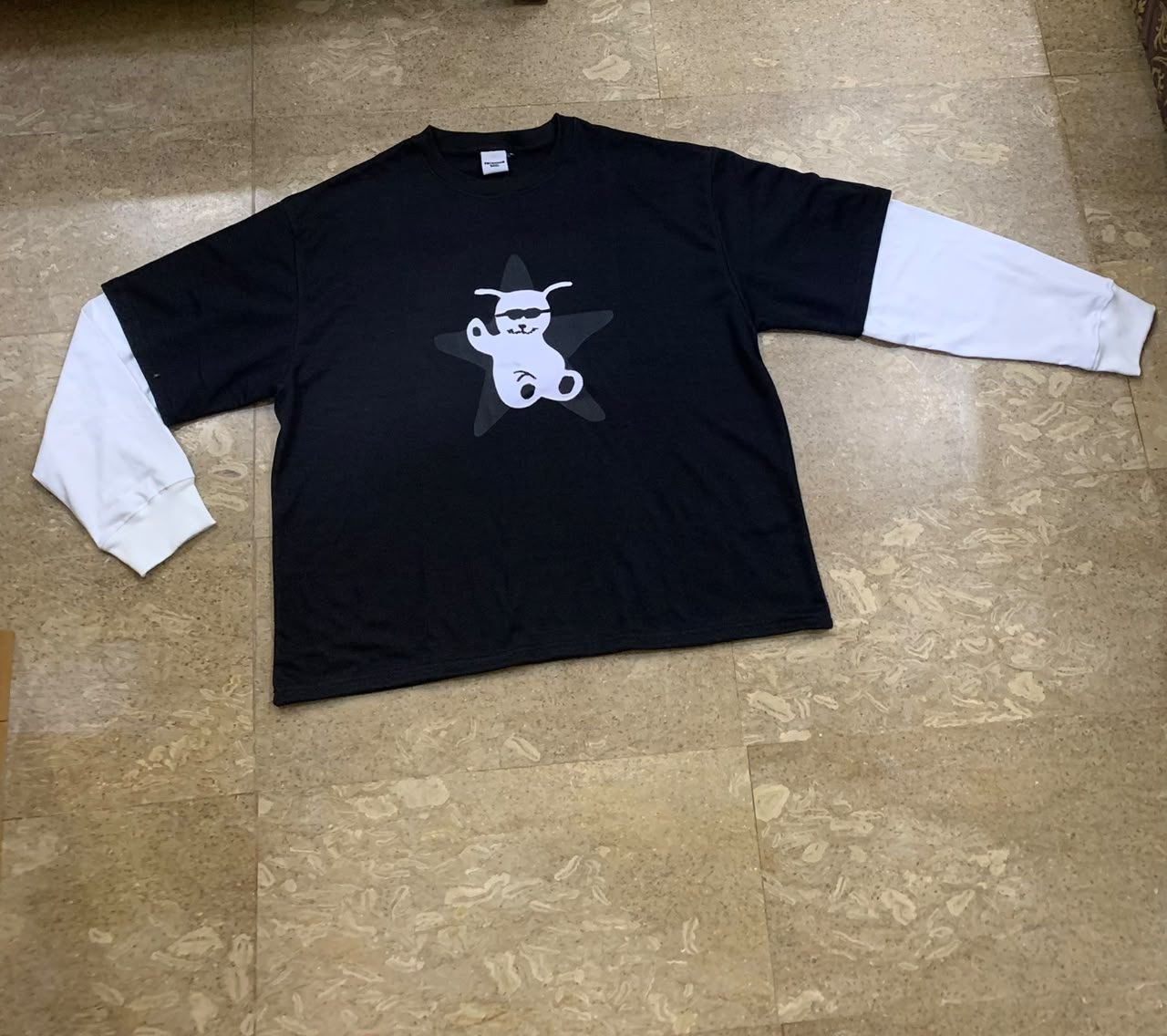 Custom long-sleeve shirt with embroidered graphic