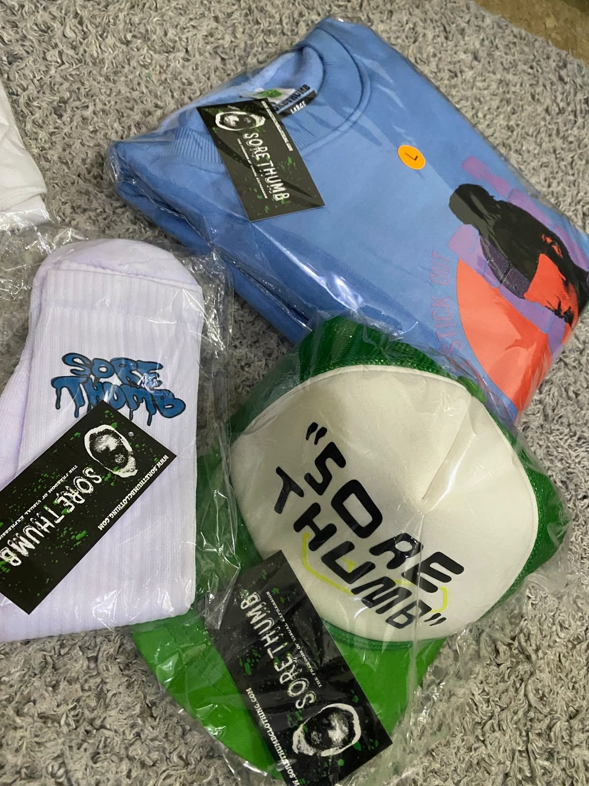 Private-label sweatshirt, socks, and cap — matching set
